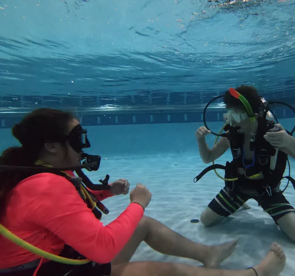 Confined-water scuba instruction in a swimming pool