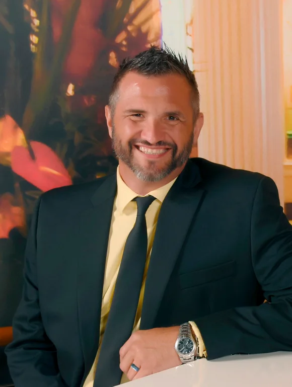 Steven Gee in professional attire